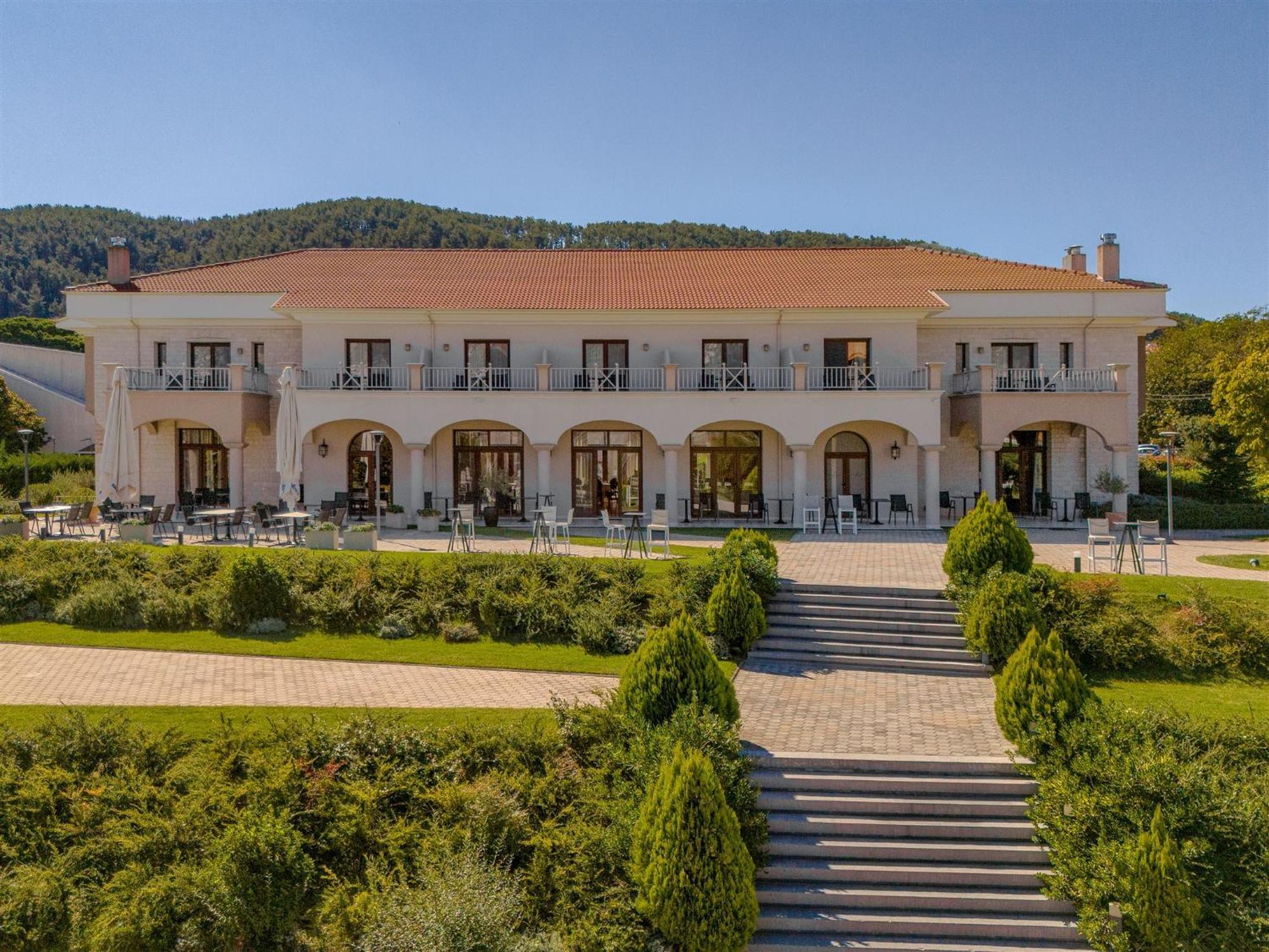 The Lake Hotel Ioannina Exterior photo The main building of the hotel