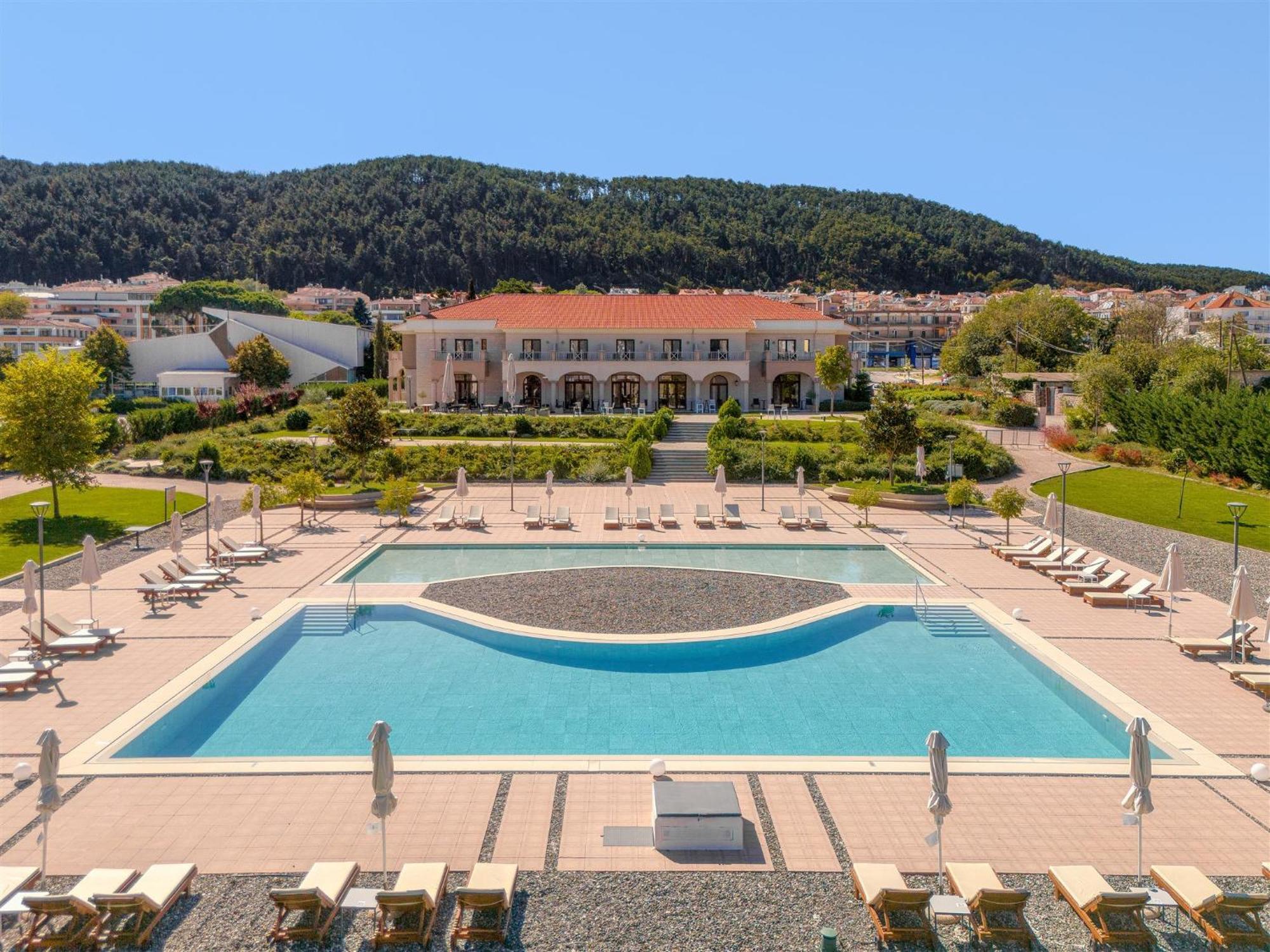 The Lake Hotel Ioannina Exterior photo The resort's main pool